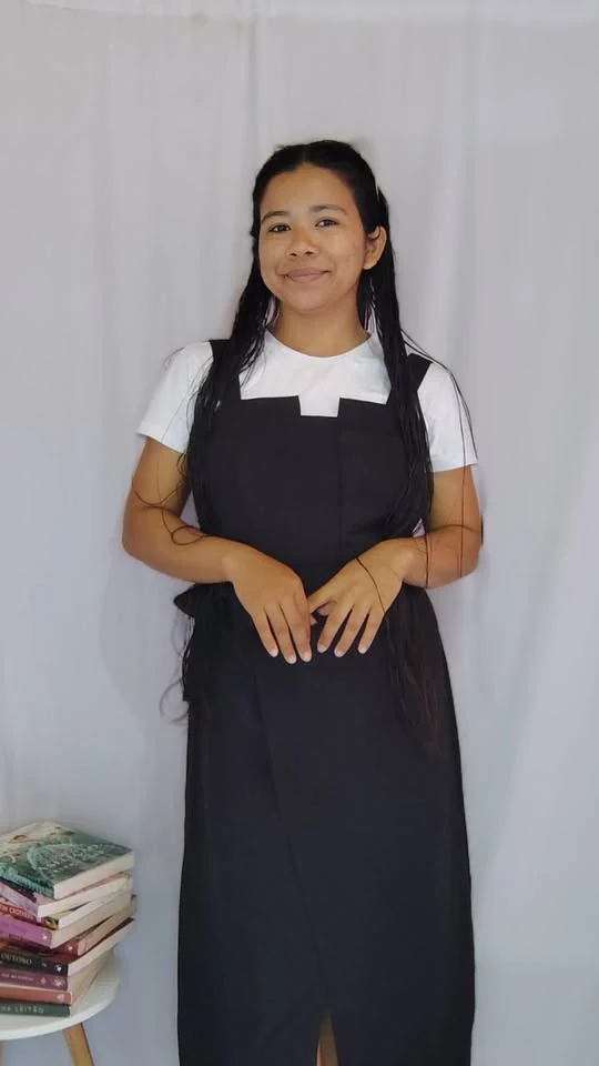 Celeste Reis em retrato de vestido preto
